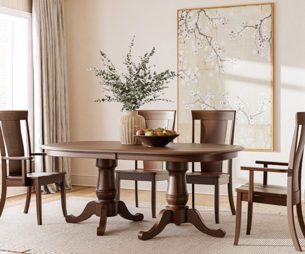 Dining room furniture with round wood table and matching chairs in a bright neutral space.